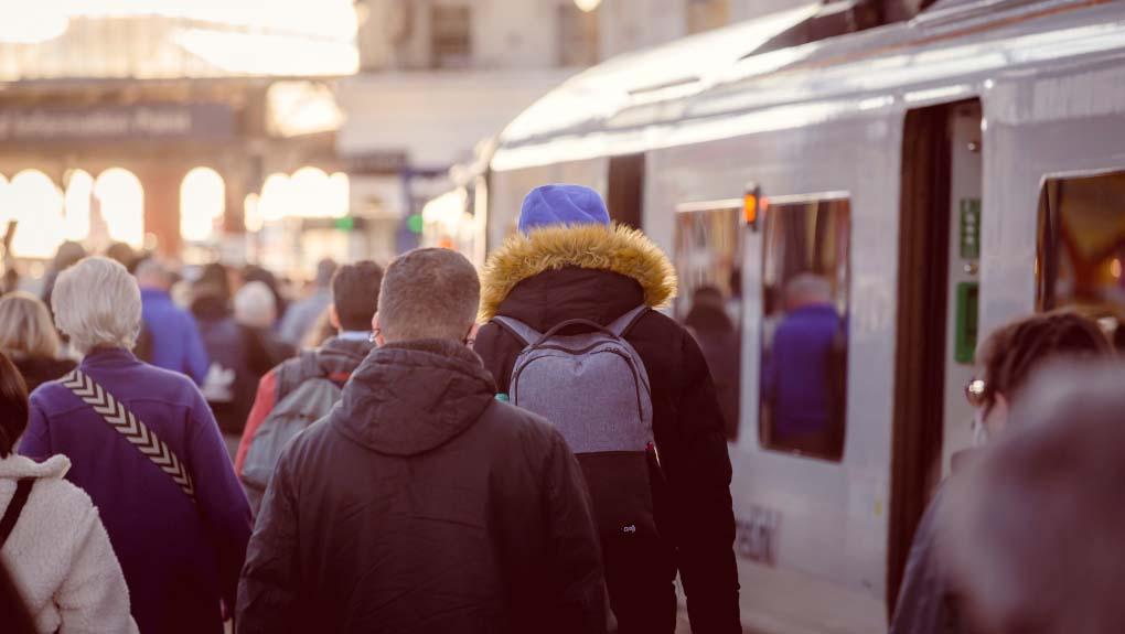 Passengers at a railway station in Britain