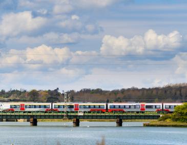 Greater Anglia train crossing a railway bridge