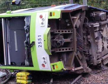 Image of overturned tram at Sandilands junction, by the Rail Accident Investigation Branch. Licensed under the Open Government Licence v3.0.